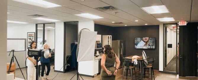employee taking headshot for fractional marketing client